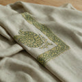 Akhdar Kashmiri pashmina ghutra in natural ecru with sage green paisley sozni embroidery