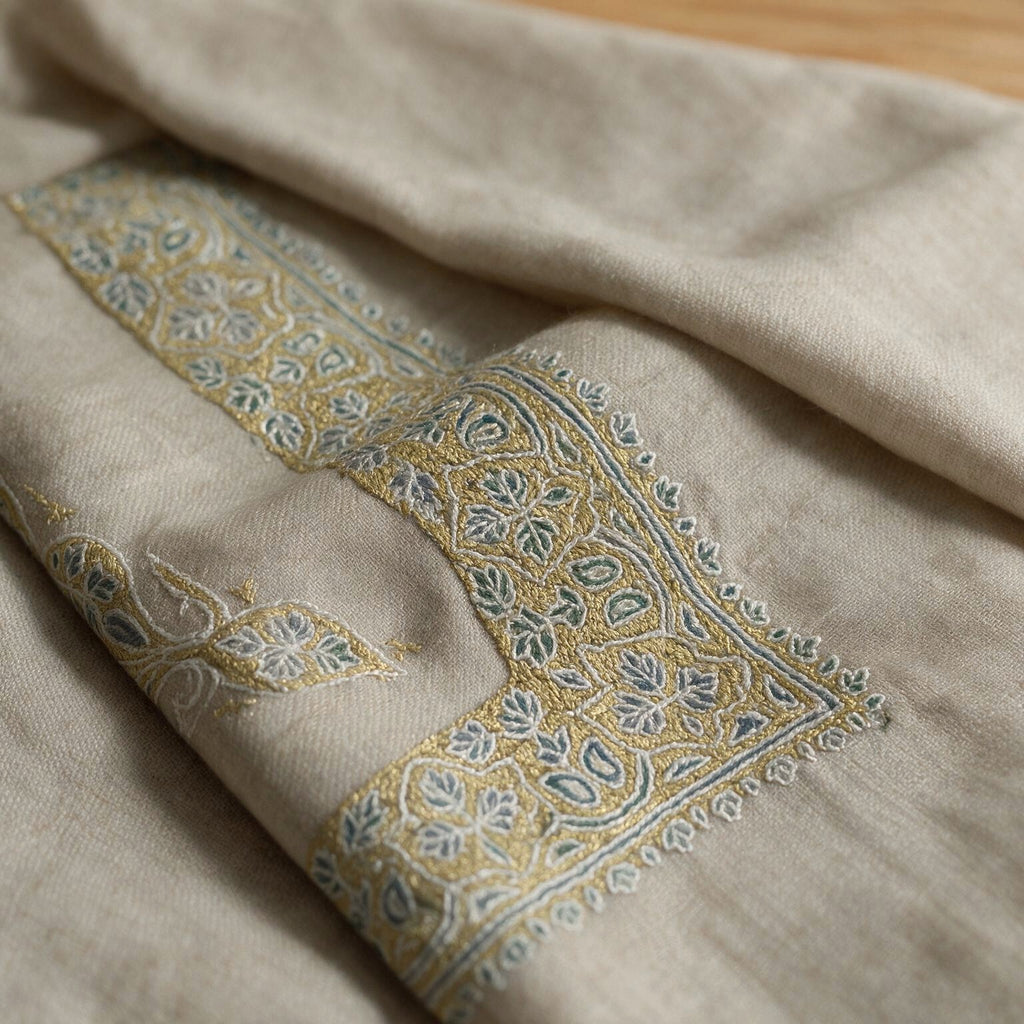 Dhabab Kashmiri pashmina ghutra in natural ecru with pale blue and gold paisley sozni embroidery