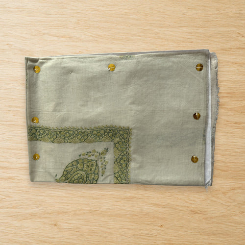 Akhdar Kashmiri pashmina ghutra laid flat on a wooden table, true to life colour