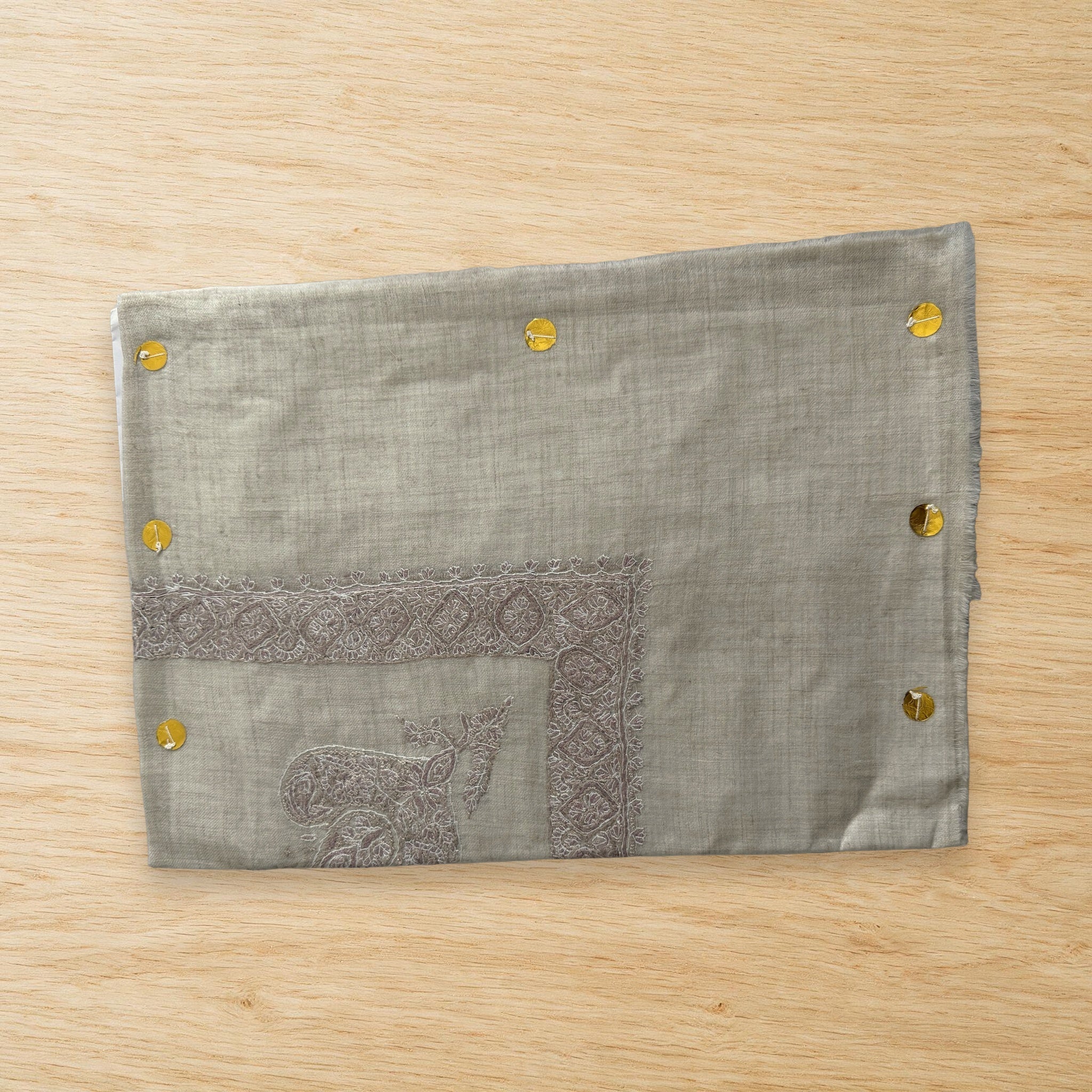 Sadaf Kashmiri pashmina ghutra laid flat on a wooden table, true to life colour