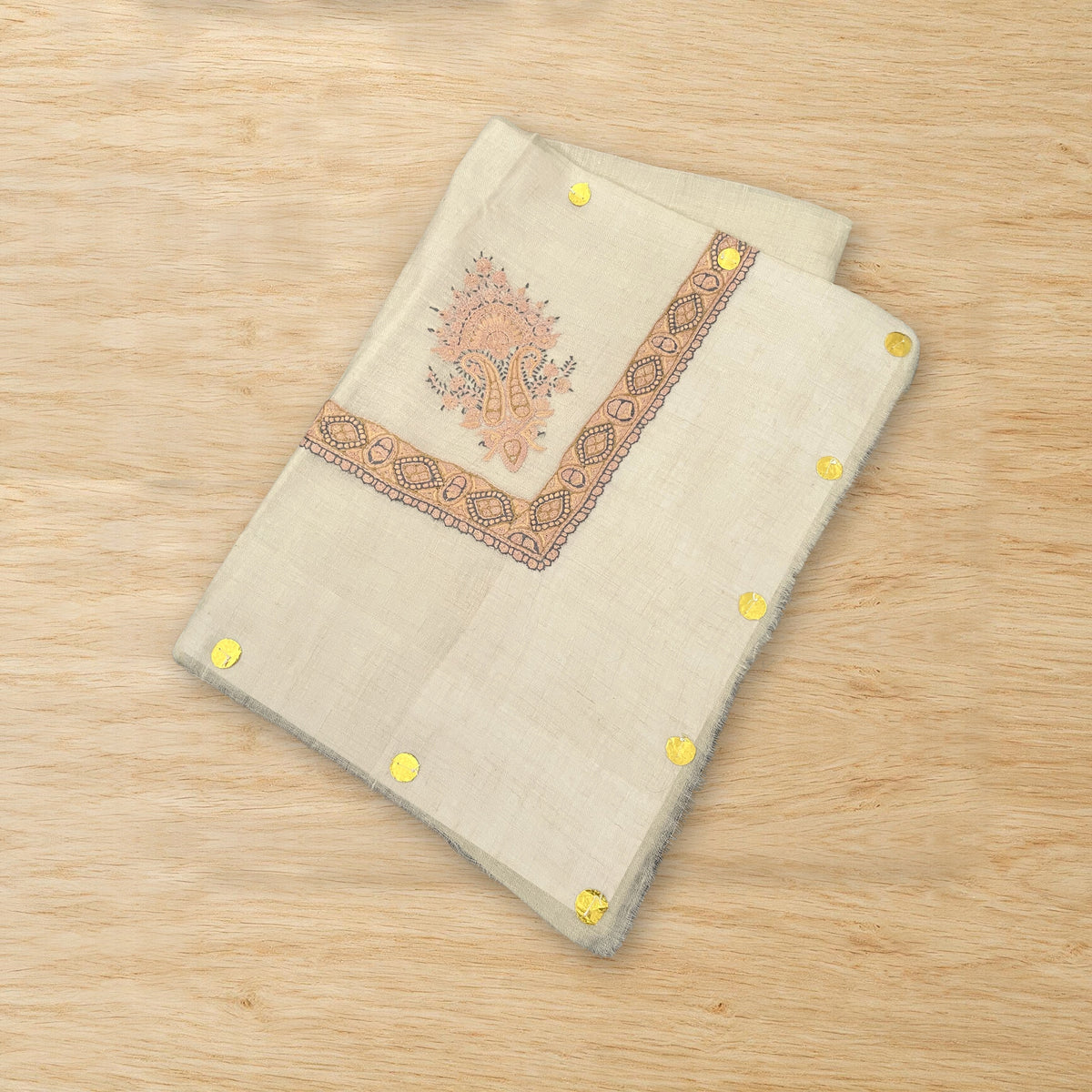 Mishmish Kashmiri pashmina ghutra folded on a wooden table, true to life colour