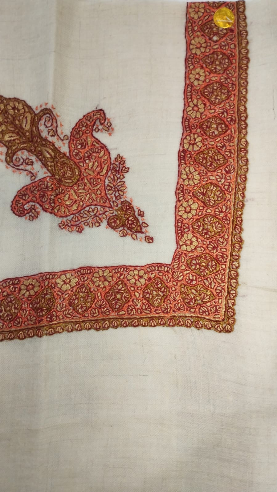 Mughra Kashmiri pashmina ghutra, cream base with a coral red corner motif and a coral and ochre floral border