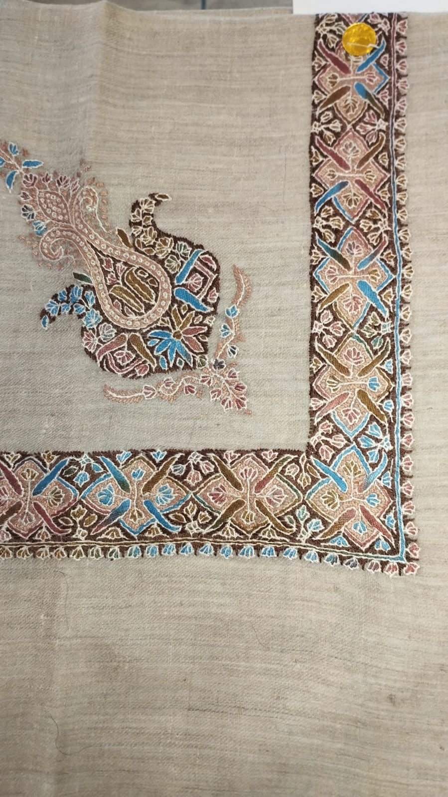 Bunduq Kashmiri pashmina ghutra, oatmeal base with a chocolate brown, dusty pink and sky blue corner motif and lattice border