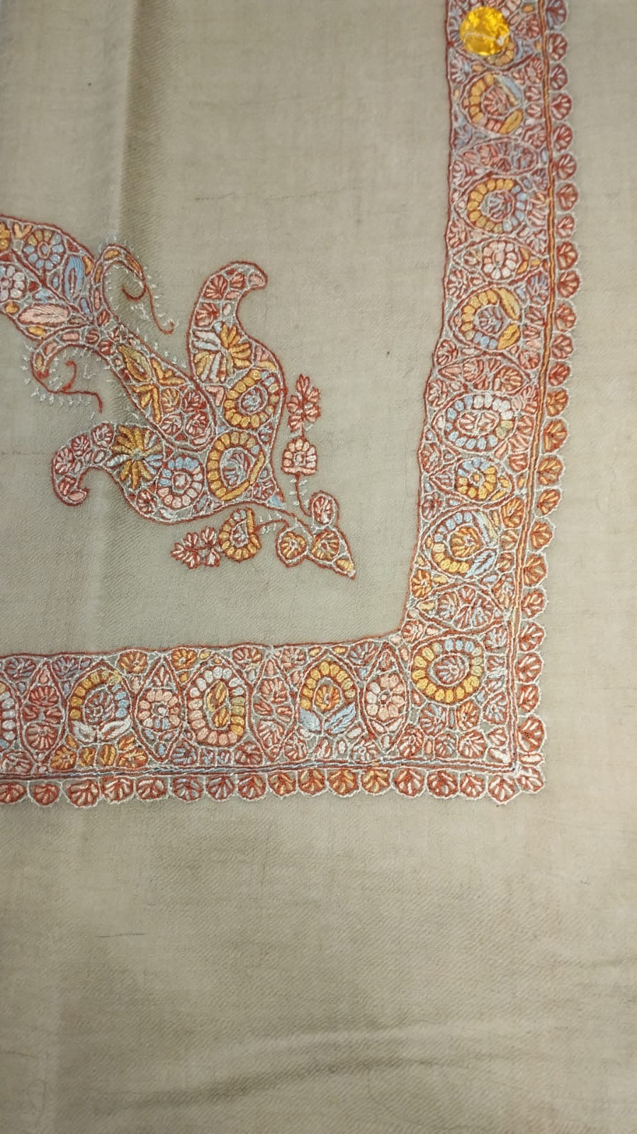 Usfur Kashmiri pashmina ghutra, oatmeal base with a coral, saffron and pale blue corner motif and medallion border