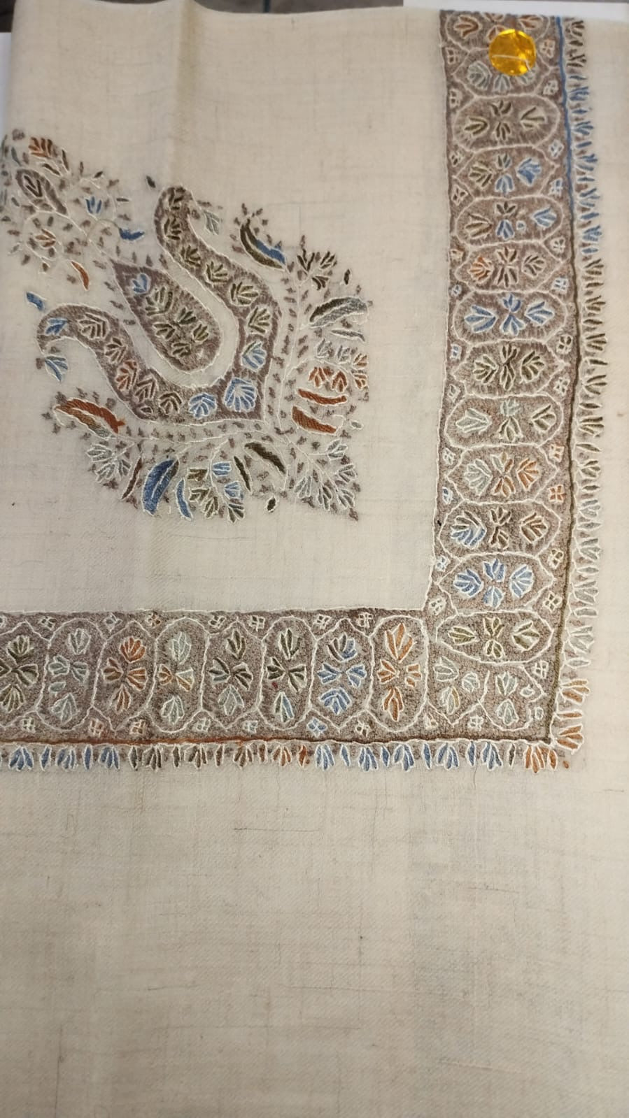 Hubara Kashmiri pashmina ghutra, oatmeal base with a taupe, sky blue and rust corner motif and a taupe panelled border