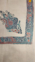 Shaheen Kashmiri pashmina ghutra, oatmeal base with a slate blue and teal corner motif and border, flecked with coral
