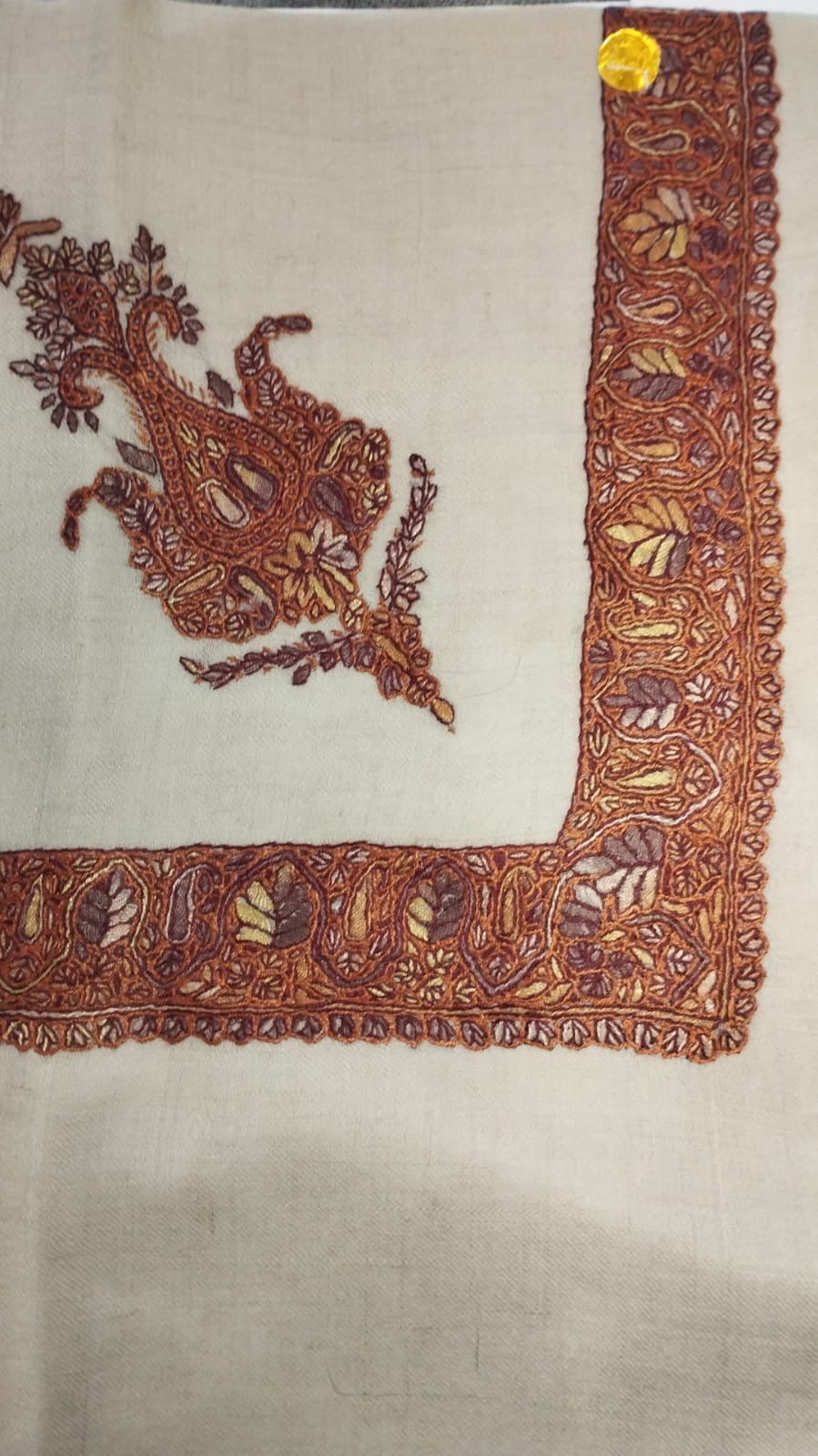 Qirfa Kashmiri pashmina ghutra, oatmeal base with a rust copper corner motif and border, with ochre and mauve leaves