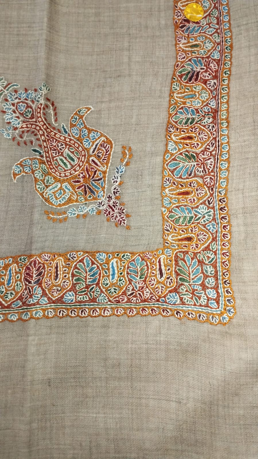 Asal Kashmiri pashmina ghutra, oatmeal base with an amber, pale blue and ivory corner motif and an amber border of pale blue leaves