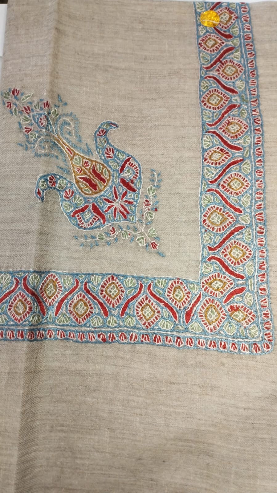 Mawj Kashmiri pashmina ghutra, oatmeal base with a pale blue and crimson corner motif and border, touched with olive gold
