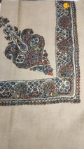 Abanus Kashmiri pashmina ghutra, oatmeal base with a dark brown and ivory corner motif and border, scattered with pastel blue, rose and saffron flowers