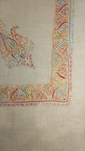 Dinar Kashmiri pashmina ghutra, oatmeal base with an apricot gold corner motif and border, with sky blue and crimson paisleys