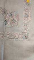 Hilal Kashmiri pashmina ghutra, stone grey base with an ivory corner motif and border, with teal and rust leaves