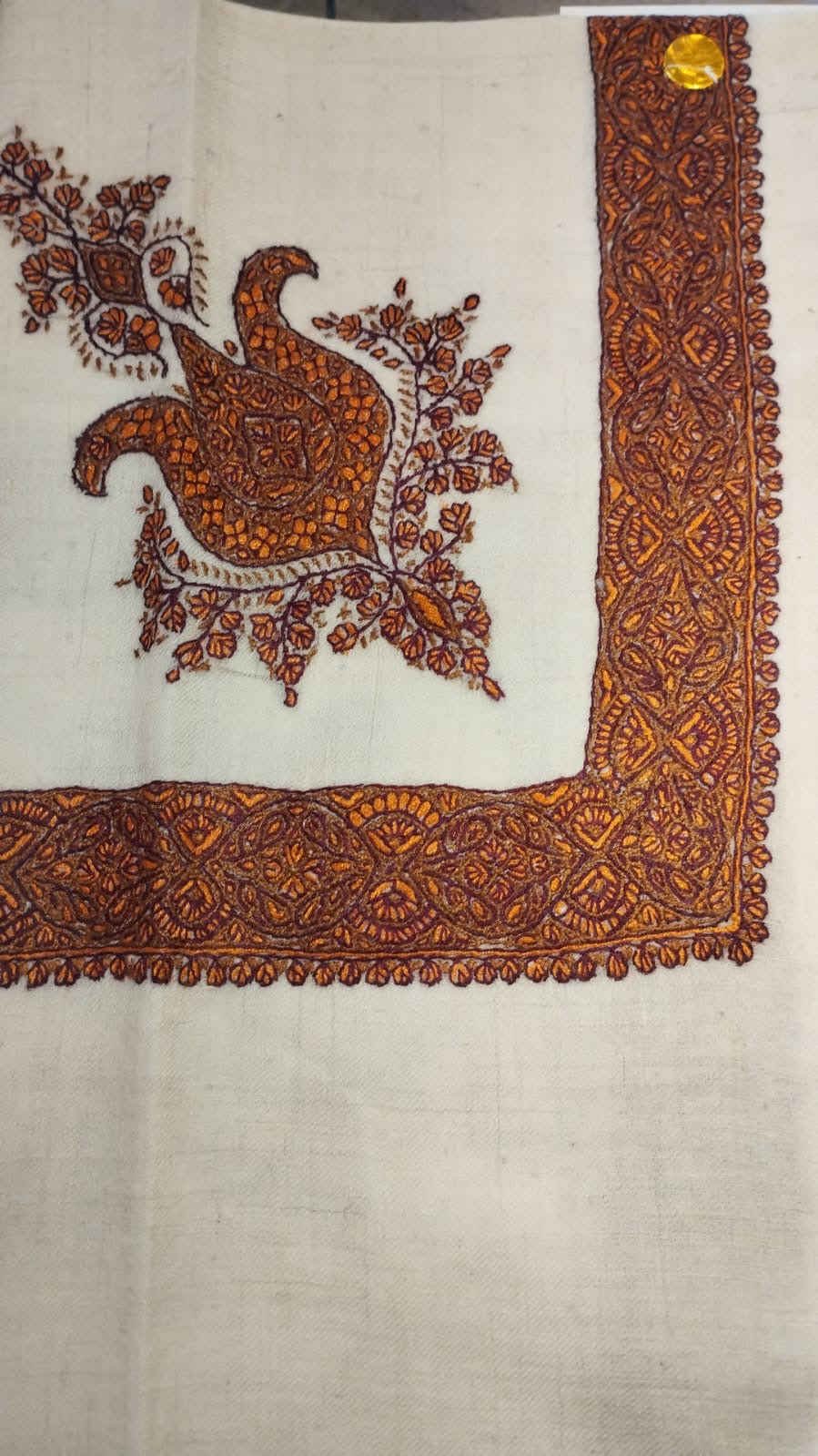 Dallah Kashmiri pashmina ghutra, cream base with a burnt copper corner motif and dense border