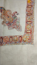Kanz Kashmiri pashmina ghutra, oatmeal base with an amber gold and maroon corner motif and border, with jewel green and blue accents