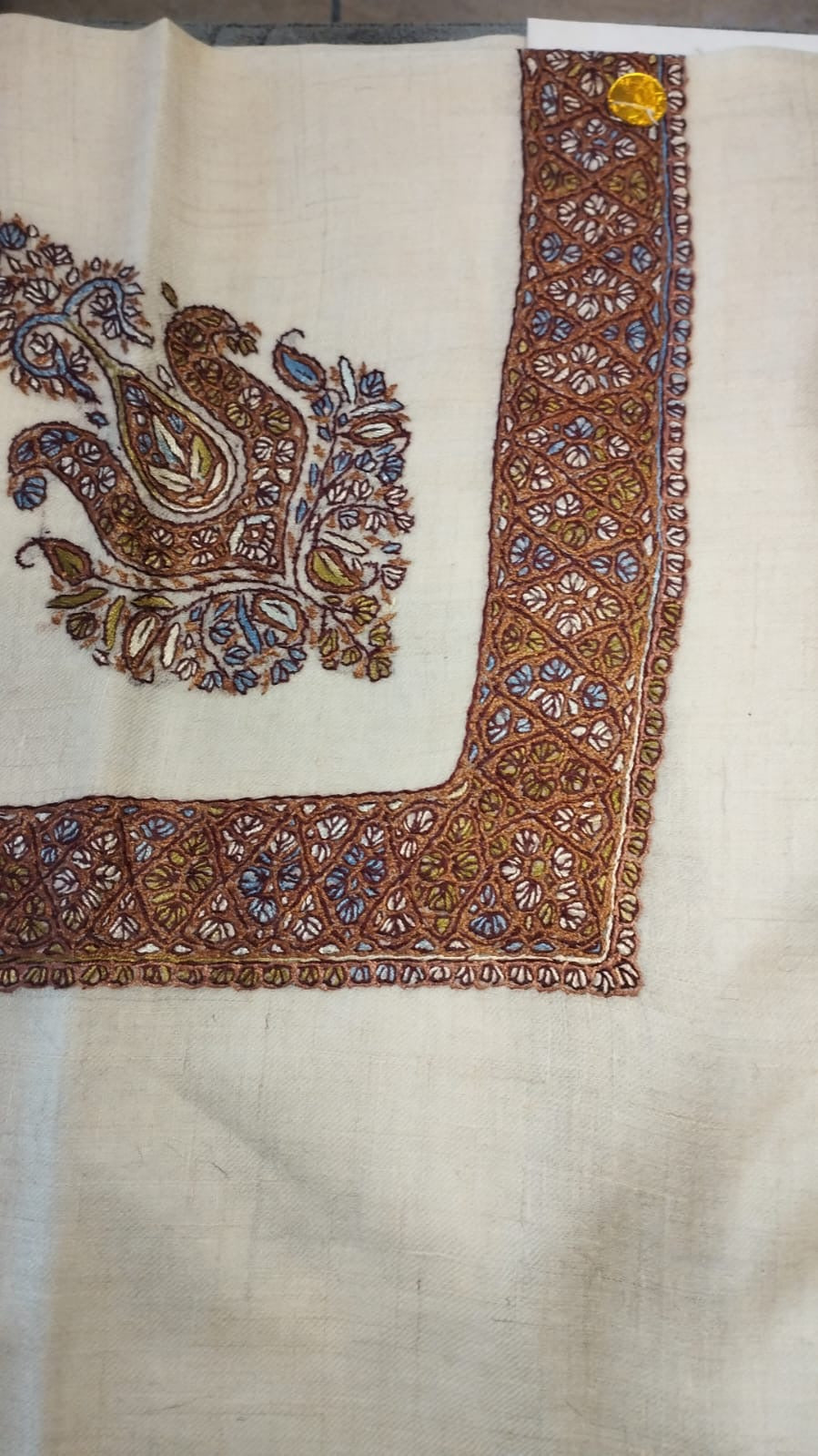 Kastana Kashmiri pashmina ghutra, oatmeal base with a chestnut brown corner motif and lattice border, with violet blue flowers