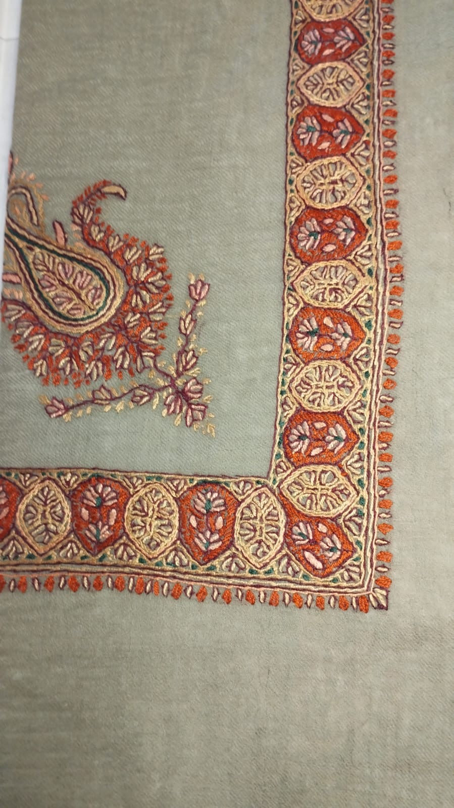 Ghaf Kashmiri pashmina ghutra, pale sage base with a coral red and ivory corner motif and medallion border