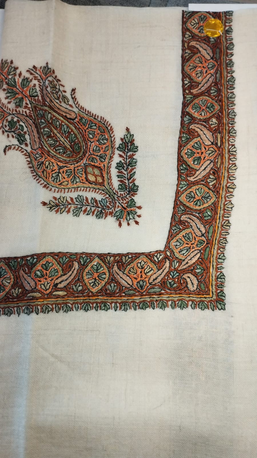 Oud Kashmiri pashmina ghutra, cream base with a peach and teal corner motif and a dark brown paisley border