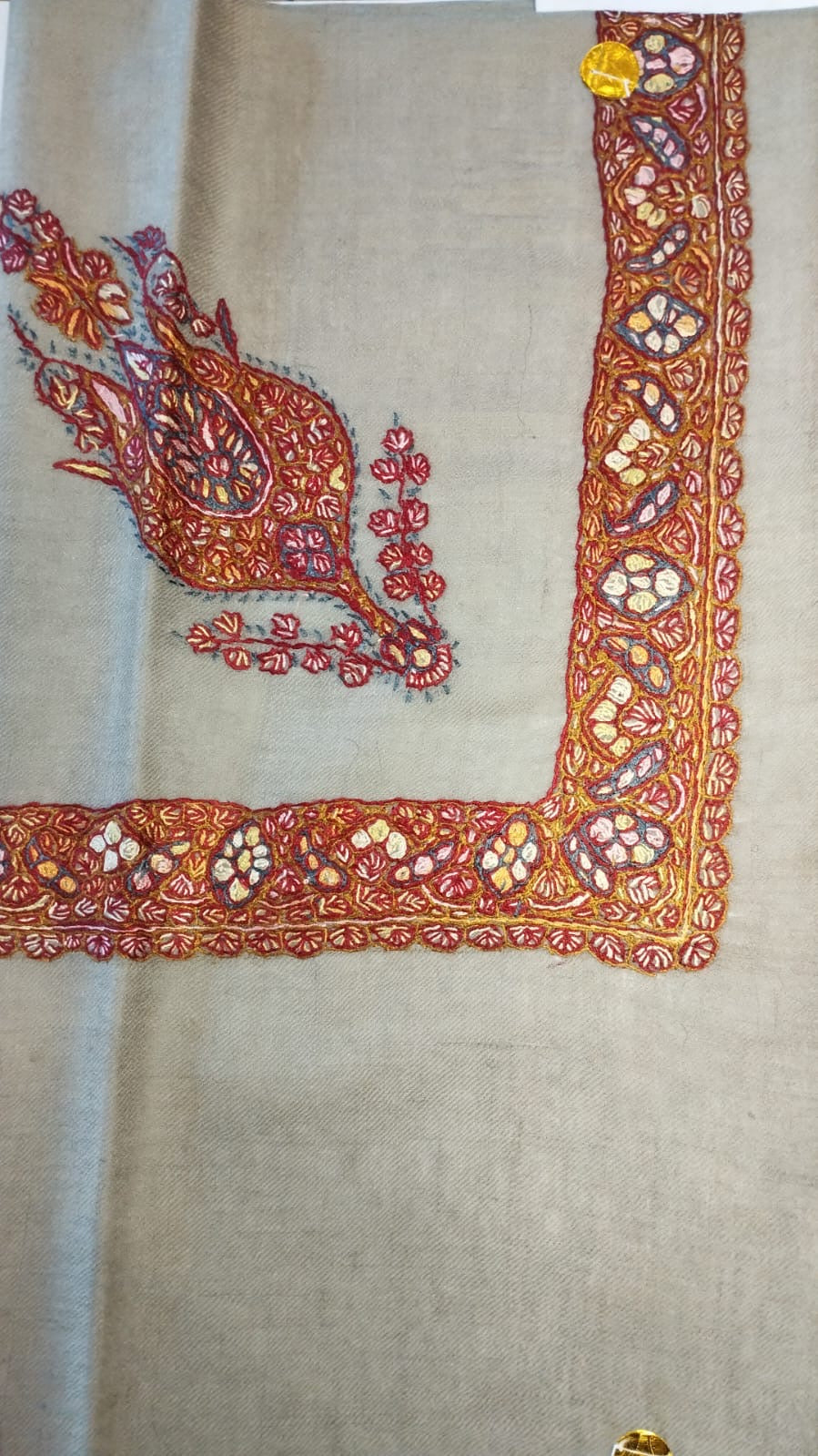 Zereshk Kashmiri pashmina ghutra, oatmeal base with a burnt orange and raspberry corner motif and border