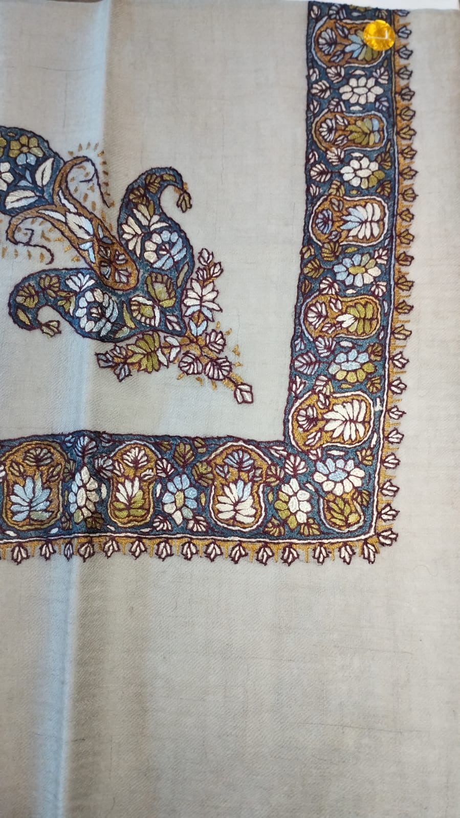 Ghawwas Kashmiri pashmina ghutra, oatmeal base with a navy corner motif and border of ivory and pale blue flowers with mustard leaves