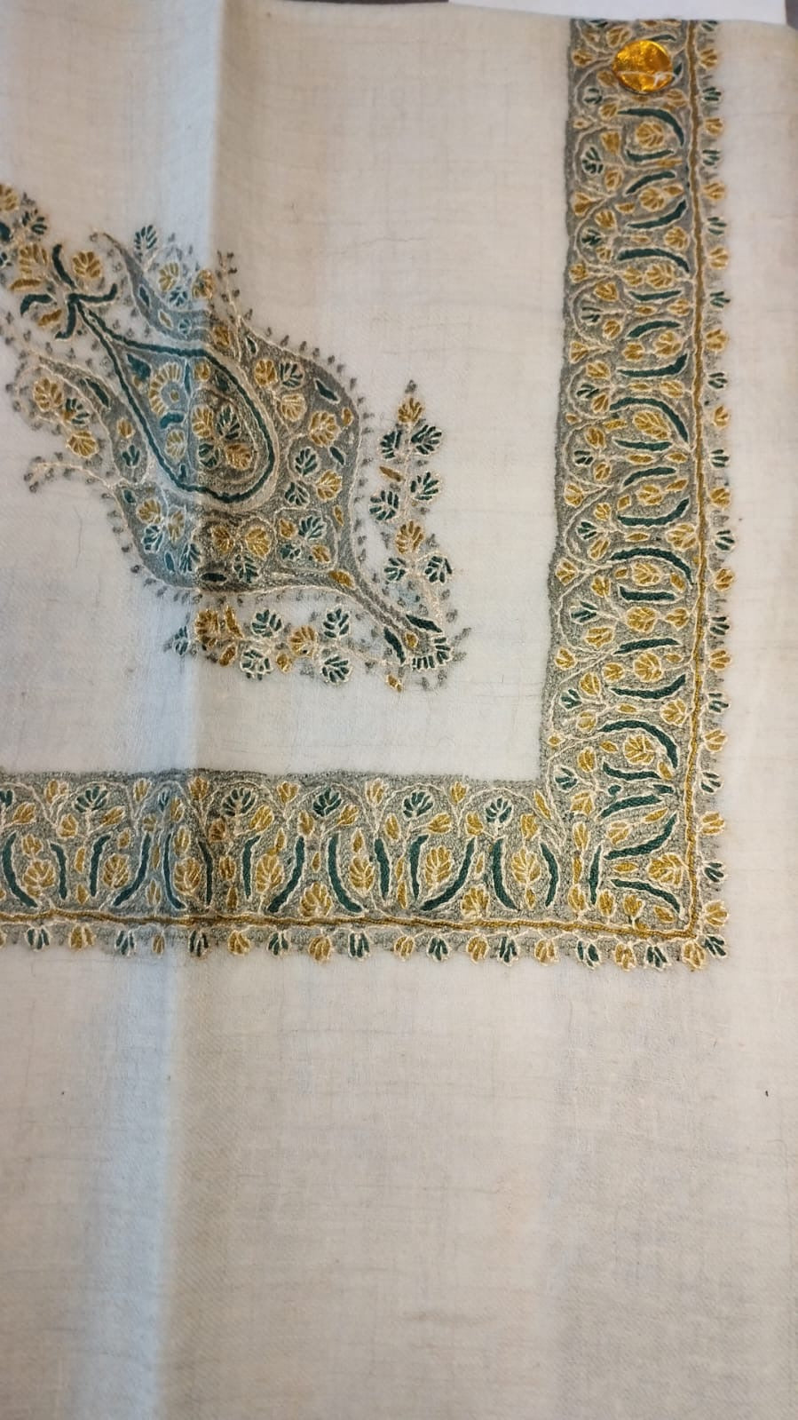 Zaatar Kashmiri pashmina ghutra, oatmeal base with an olive gold and bottle green corner motif and border