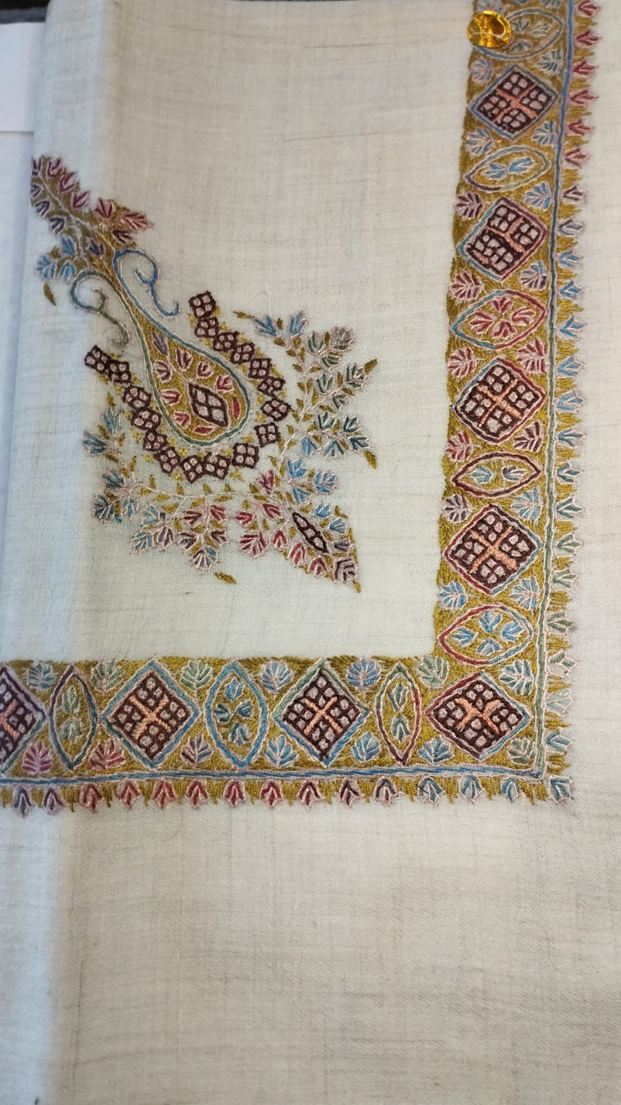Zarabi Kashmiri pashmina ghutra, oatmeal base with a mustard olive, maroon and sky blue corner motif and a geometric border