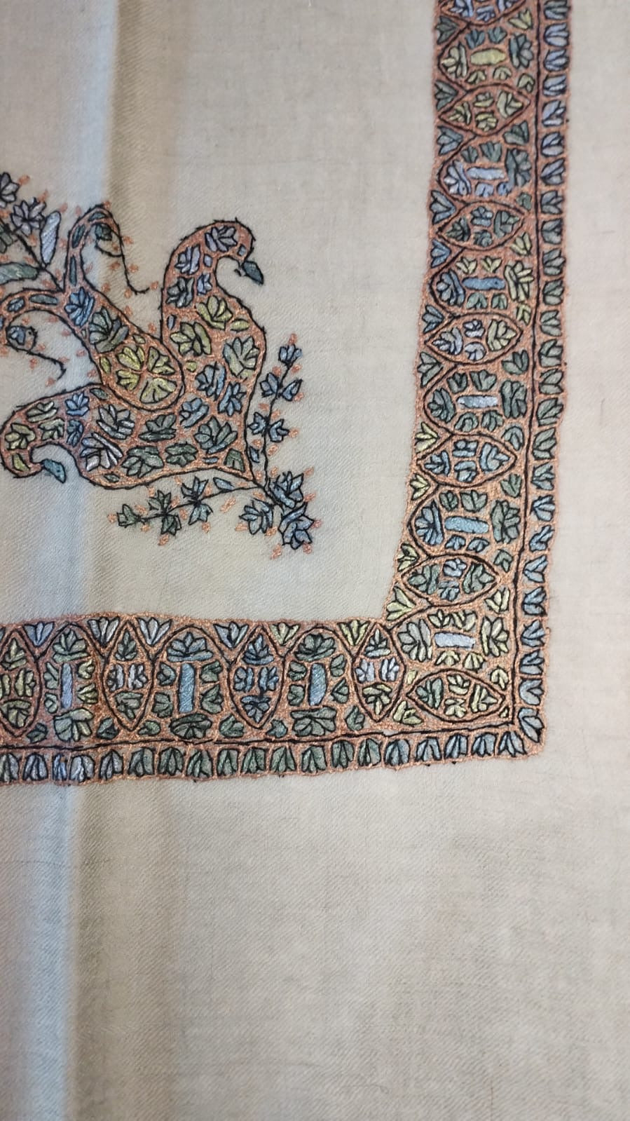 Yamama Kashmiri pashmina ghutra, oatmeal base with a copper peach and steel blue corner motif and border