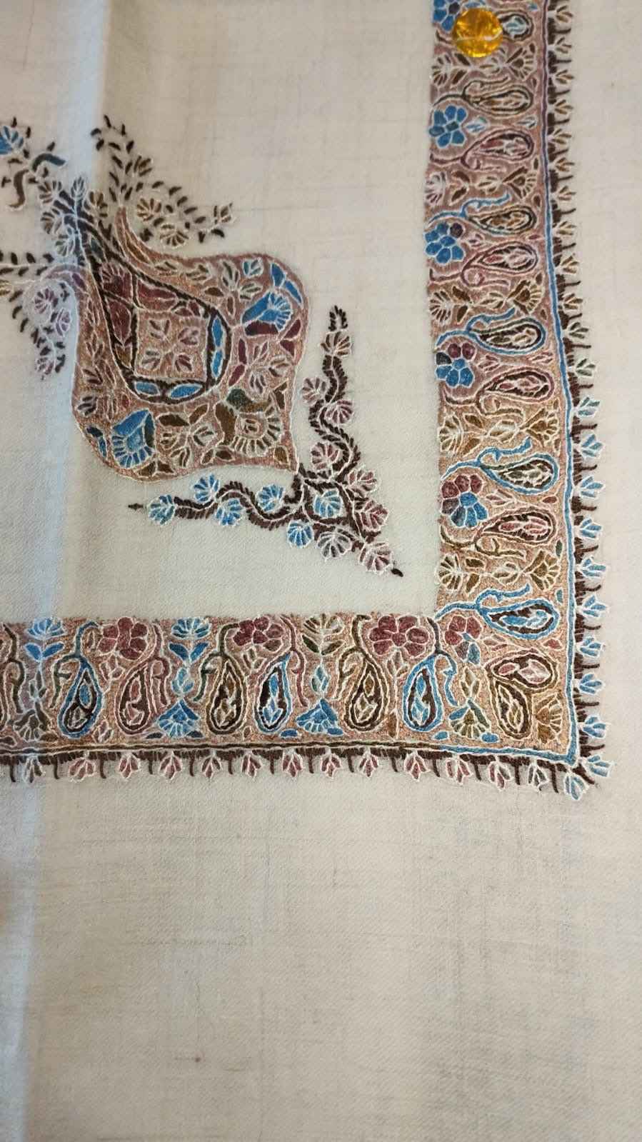 Qumri Kashmiri pashmina ghutra, oatmeal base with a dusty rose, sky blue and dark brown corner motif and paisley border