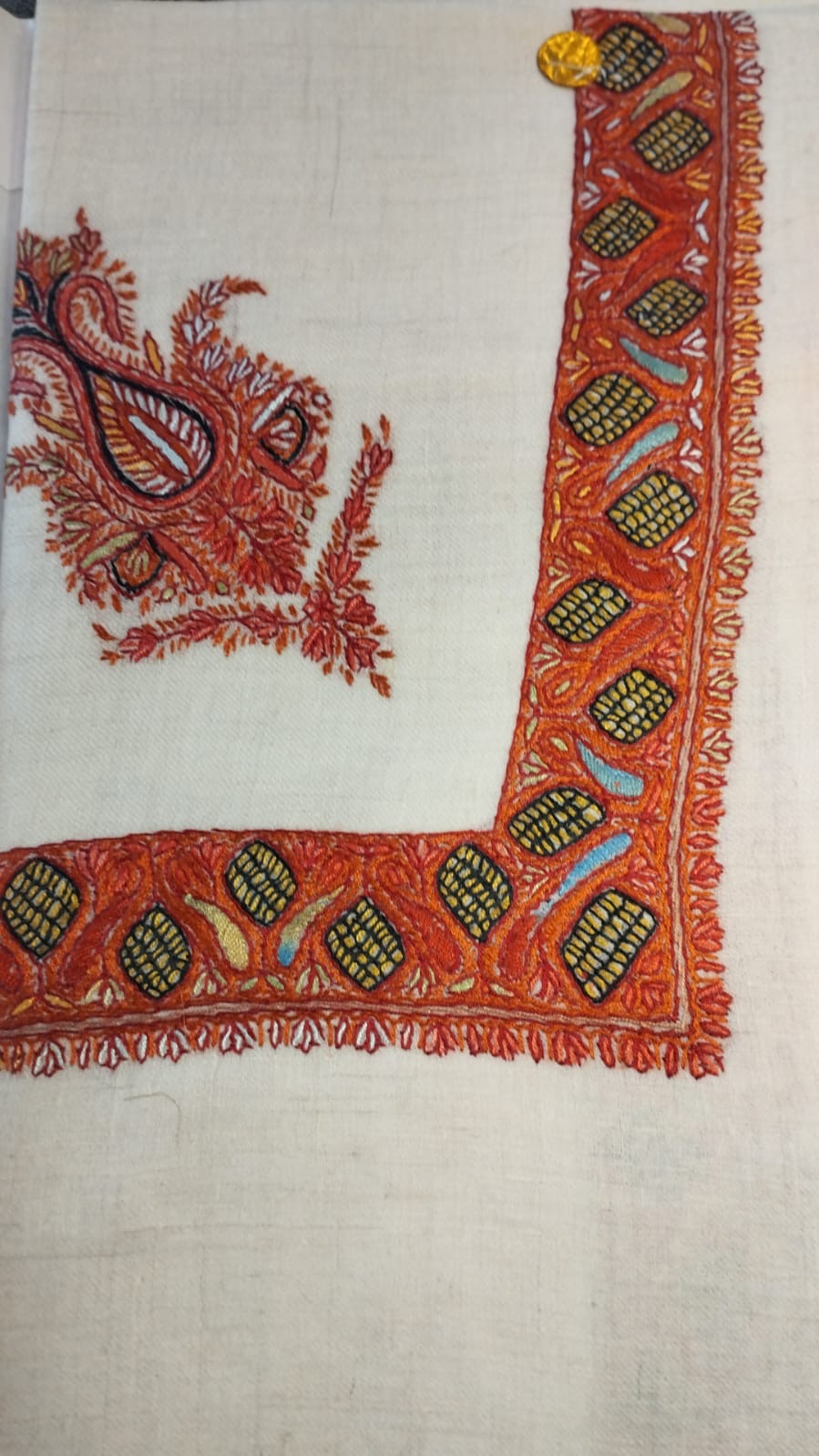 Qabas Kashmiri pashmina ghutra, cream base with a vermilion red corner motif and a vermilion border of olive almonds with sky blue accents