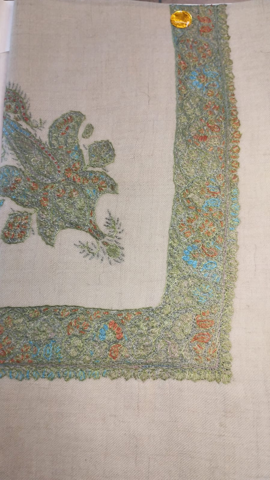 Athl Kashmiri pashmina ghutra, oatmeal base with a sage green and aqua corner motif and border, with rust accents
