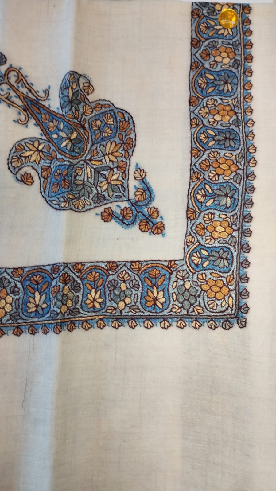 Ufuq Kashmiri pashmina ghutra, cream base with a cerulean blue and amber corner motif and border