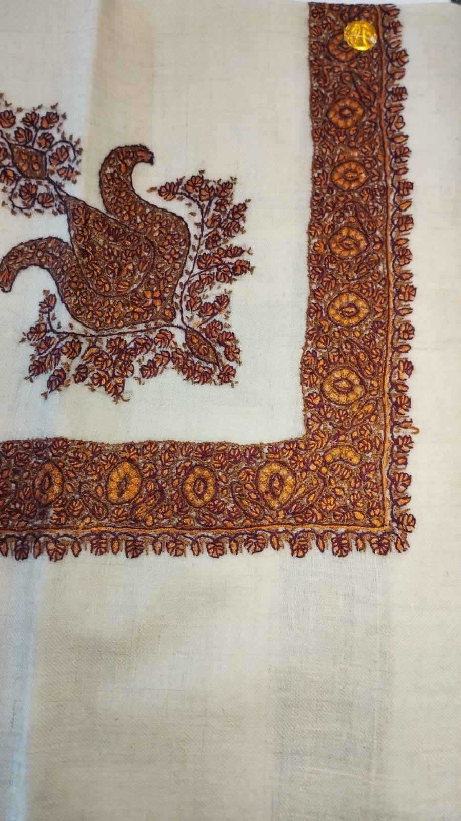 Kumait Kashmiri pashmina ghutra, cream base with a rust copper and maroon corner motif and a border of amber medallions