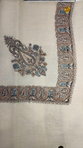 Yaraa Qalam Kaari Pashmina laid flat, apricot, charcoal and powder blue paisley corner motif and winding paisley border on a natural oatmeal ground