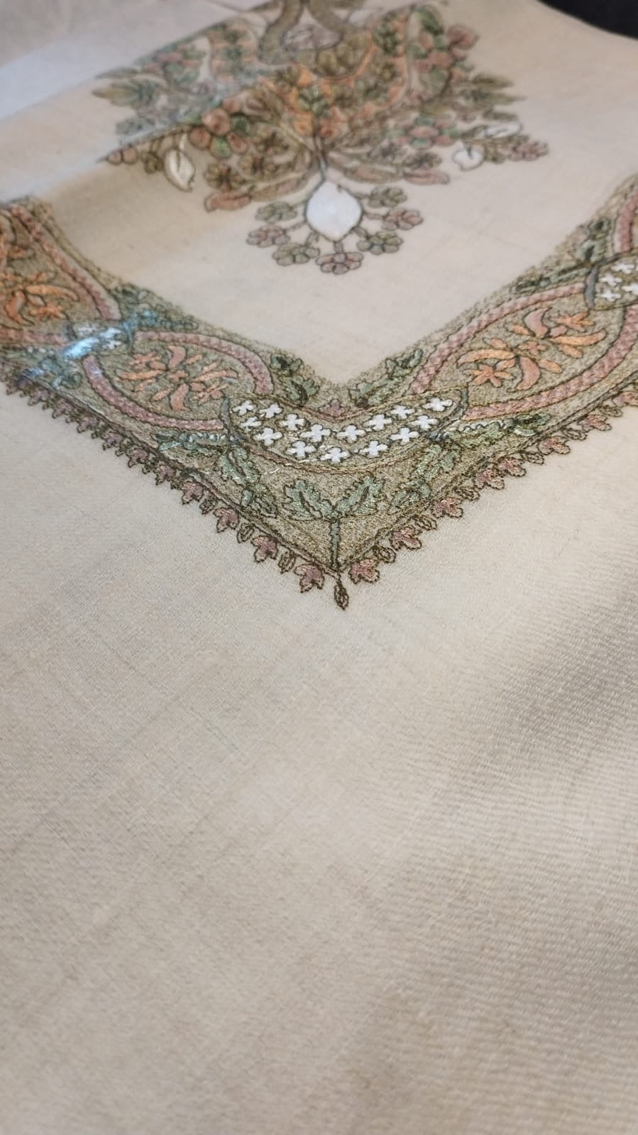 Close view of the Safsaf Qalam Kaari Pashmina corner, sage green and peach hand-drawn sozni