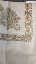 Nastaliq Qalam Kaari Pashmina laid flat, dusty pink, sage and ivory floral bouquet corner motif and interlaced ribbon border on a natural oatmeal ground