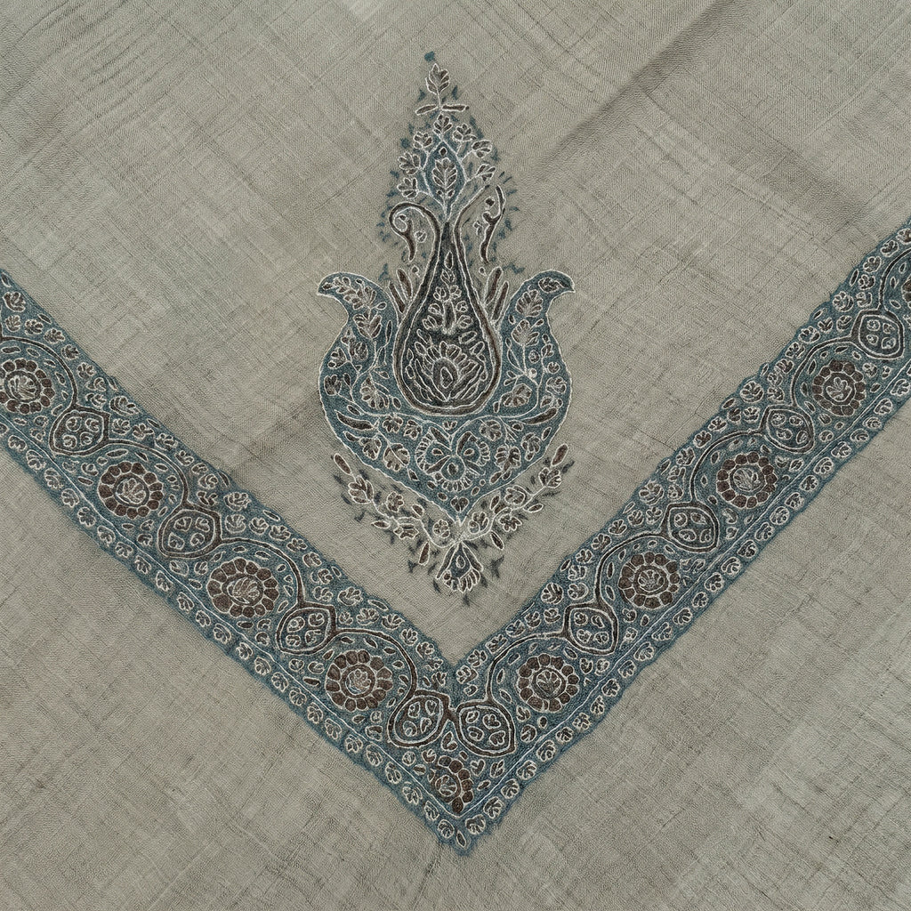 Fulaadh Kashmiri pashmina ghutra with a slate blue paisley tree corner motif and a broad slate blue rosette border