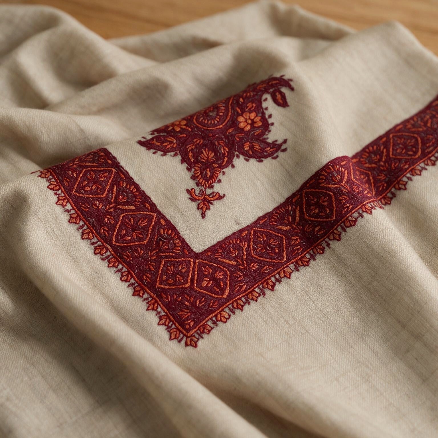 Khamri Kashmiri pashmina ghutra in natural ecru with deep crimson and rust sozni paisley border