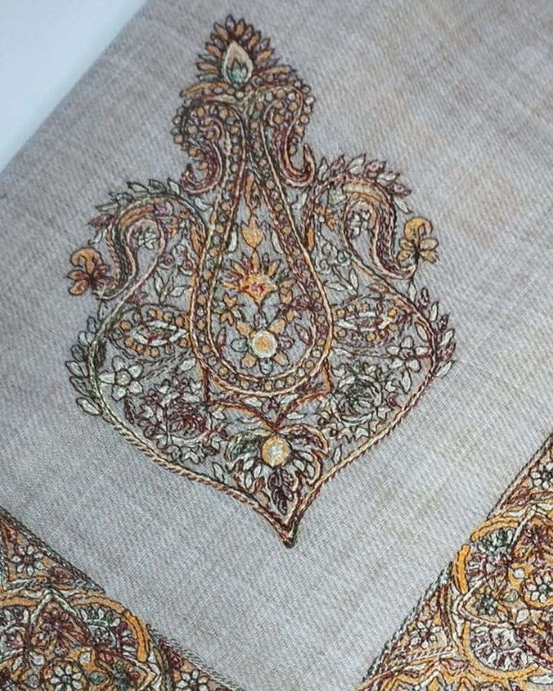 Qalam Kaari Super Turma corner motif in amber, brown and teal hand-drawn sozni on a greige ground