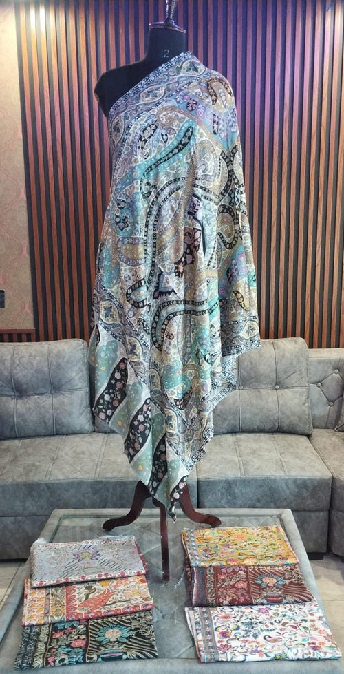 Dibaj Kashmiri semi pashmina shawl draped on a mannequin, ivory and black paisley