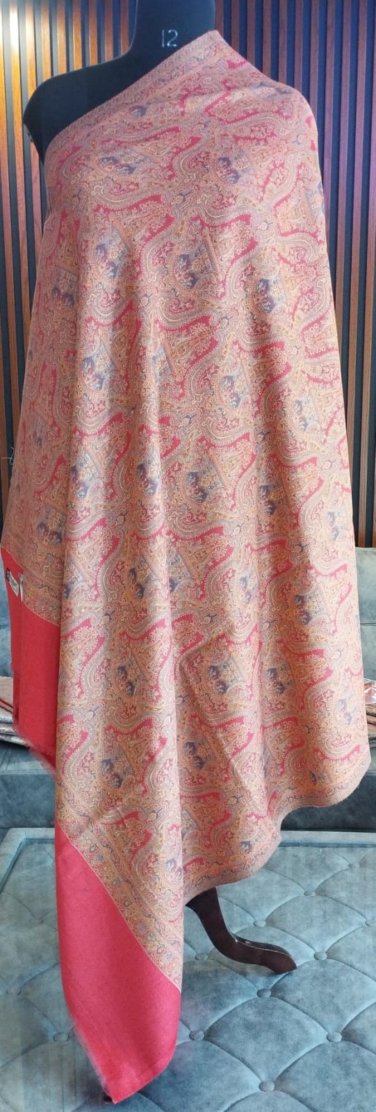 Jouri Kashmiri semi pashmina shawl draped on a mannequin, coral pink paisley