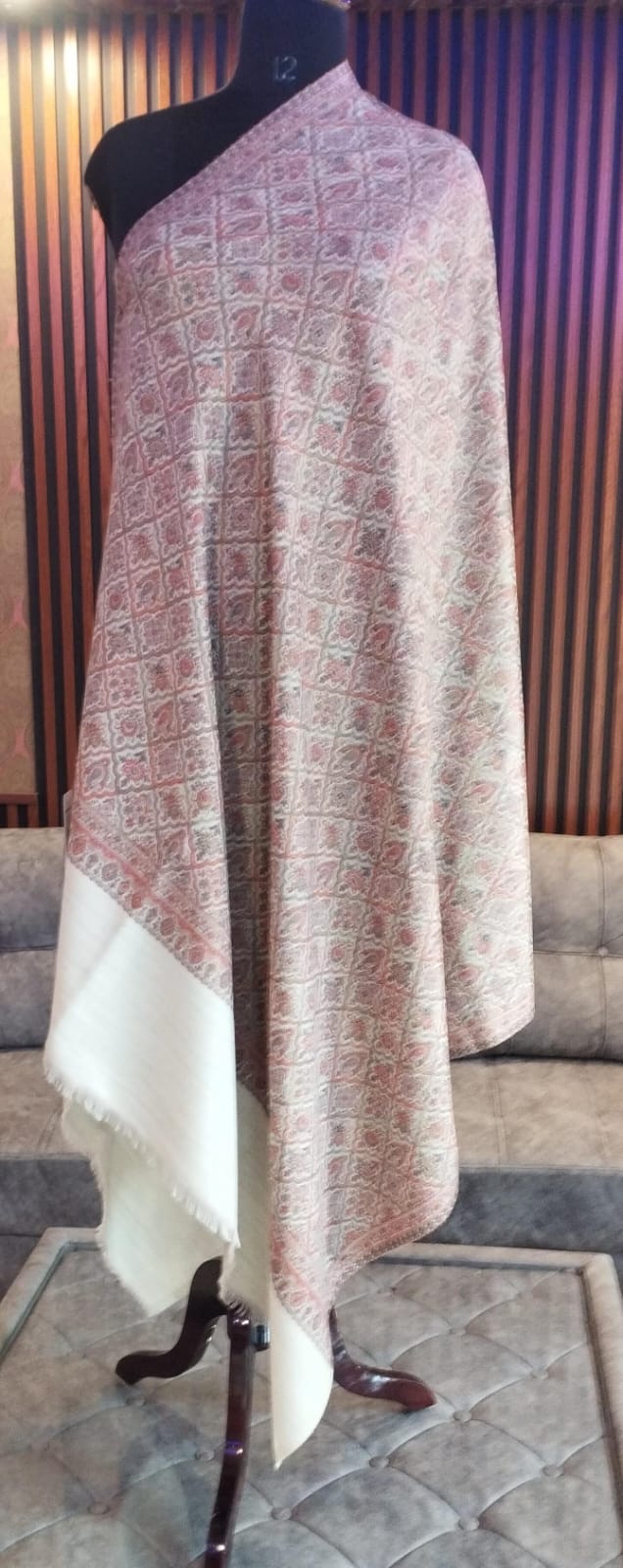 Karaz Kashmiri semi pashmina shawl draped on a mannequin, cherry red trellis on ivory