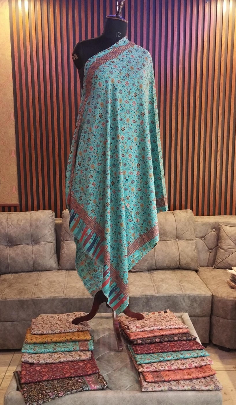 Nilufar Kashmiri semi pashmina shawl draped on a mannequin, turquoise florals