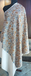 Rawda Kashmiri semi pashmina shawl draped on a mannequin, ivory with flowering vines