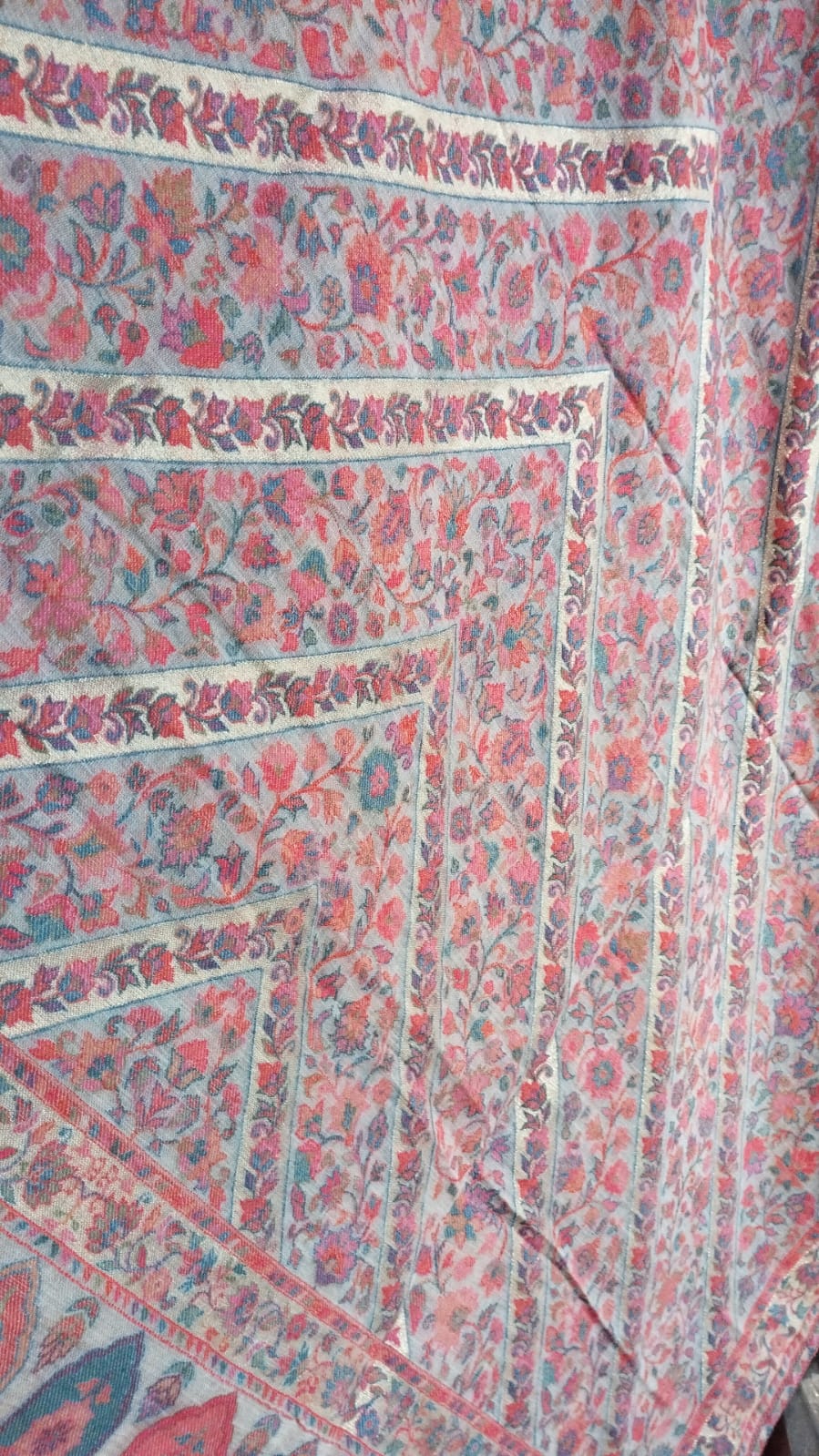 Rumman shawl close-up, coral red florals