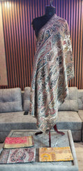 Samar Kashmiri semi pashmina stole draped on a mannequin, black and ivory paisley