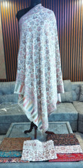 Sawsan Kashmiri semi pashmina shawl draped on a mannequin, ivory with floral sprays