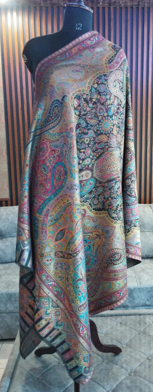 Thuraya Kashmiri semi pashmina shawl draped on a mannequin, jewel paisley on black